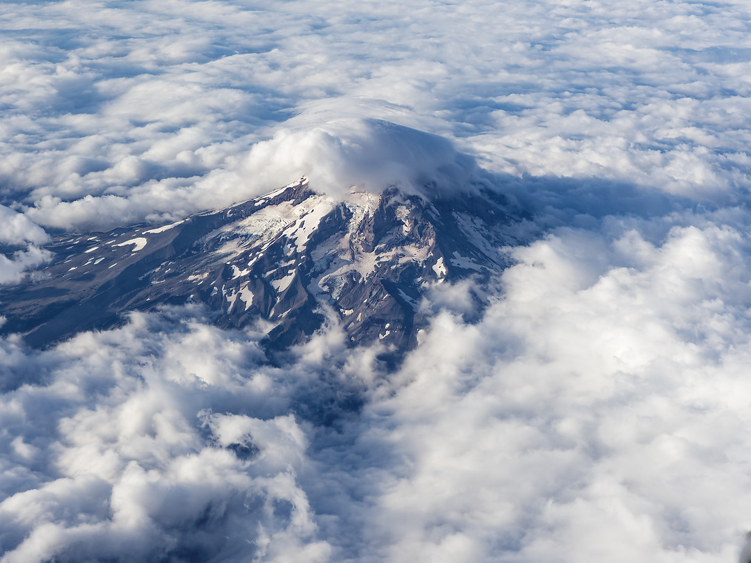 Above: Mount Hood Rising above the clouds. Taken on a flight departing PDX.