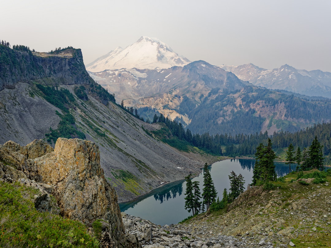 Above: Baker Looming Large over Iceberg Lake near the Saddle